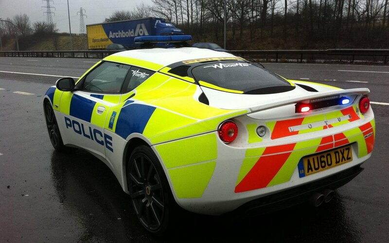 Police Car on Highway — Yellow