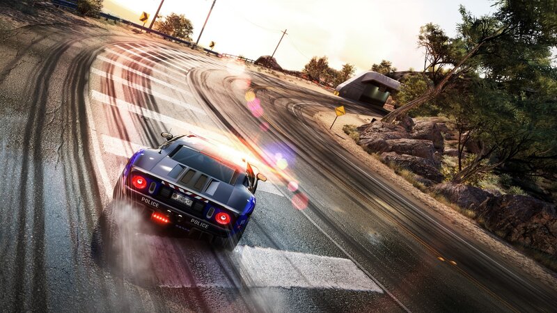 Police car racing on winding road