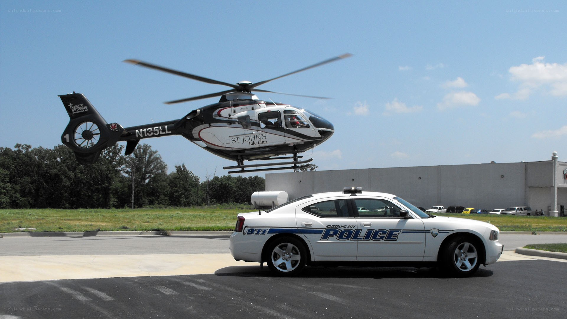 Police car with helicopter
