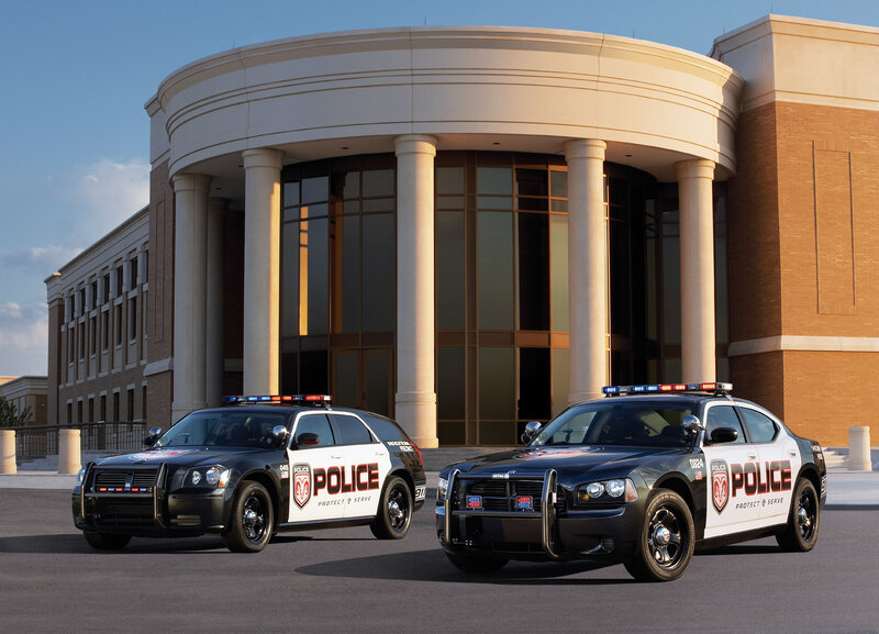 Police cars in front of station