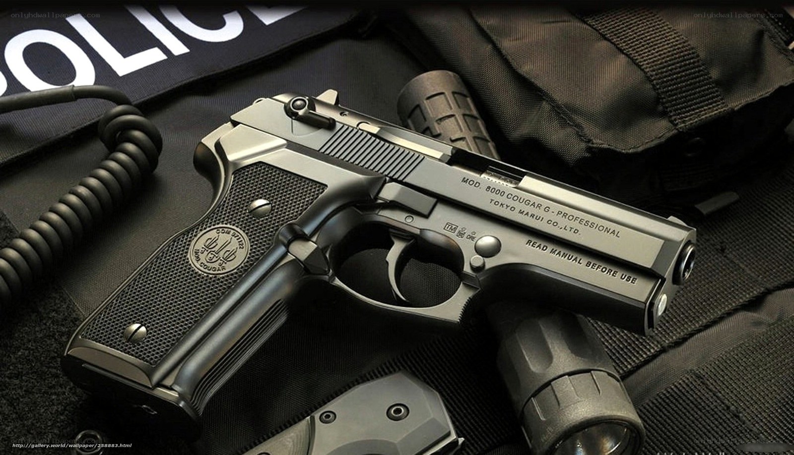 Police handgun on tactical gear
