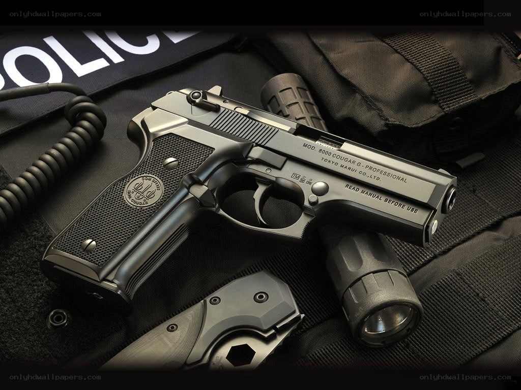 Police handgun with accessories