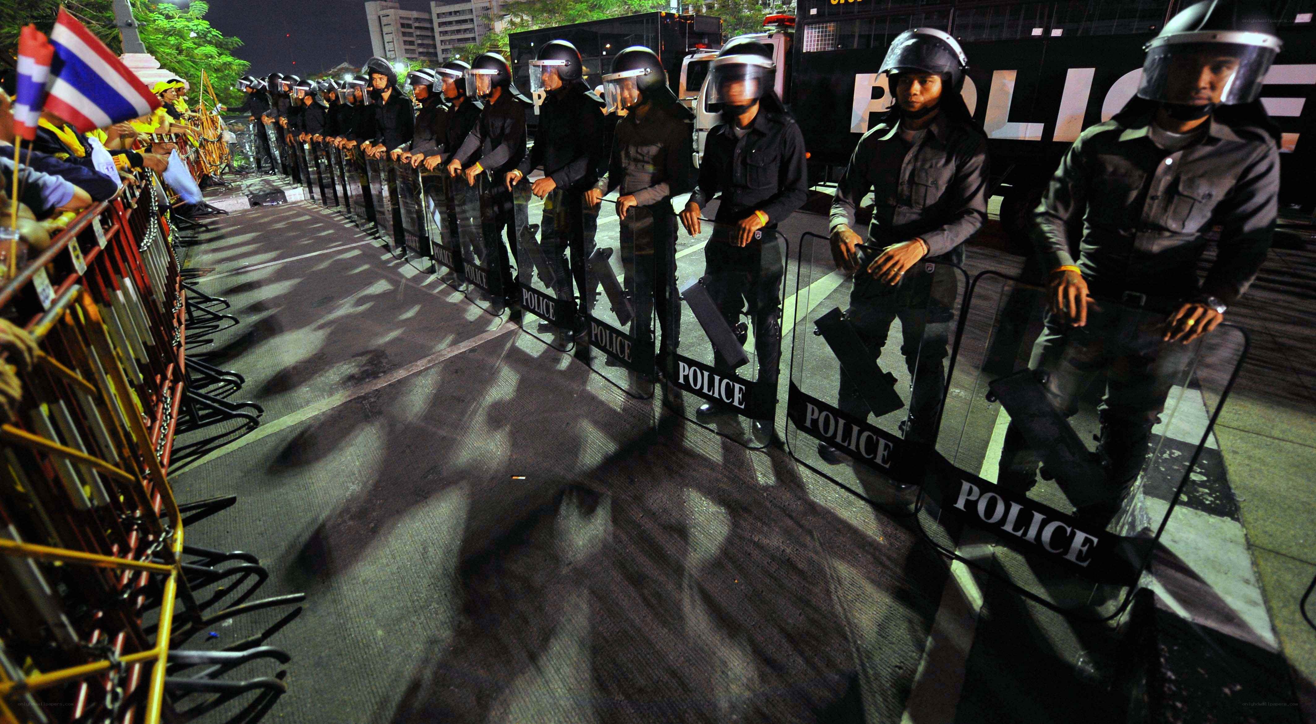 Police line at night protest