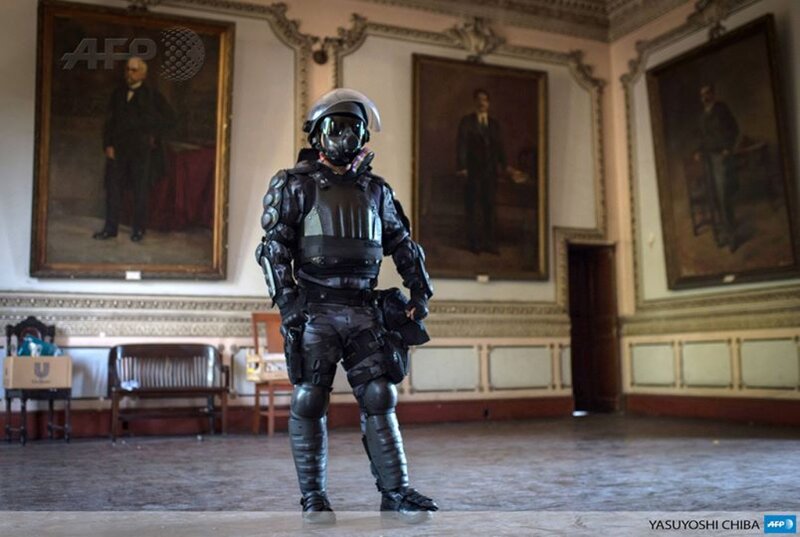 Police Officer in Riot Gear — Black, Dramatic