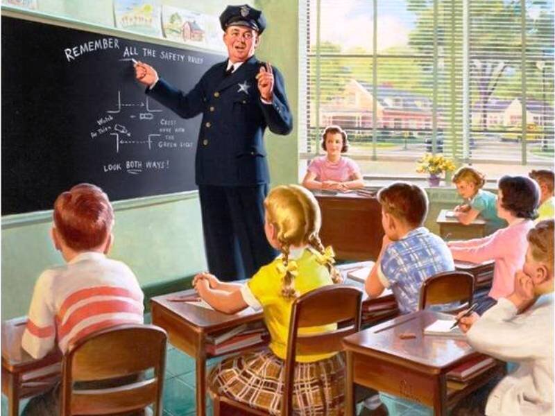 Police Officer Teaching Children