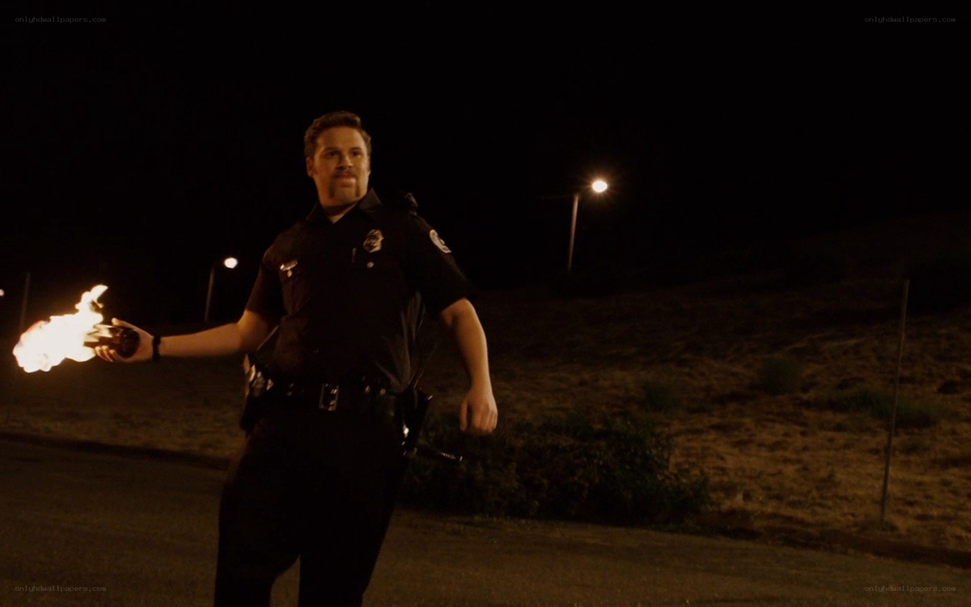 Police officer with fire