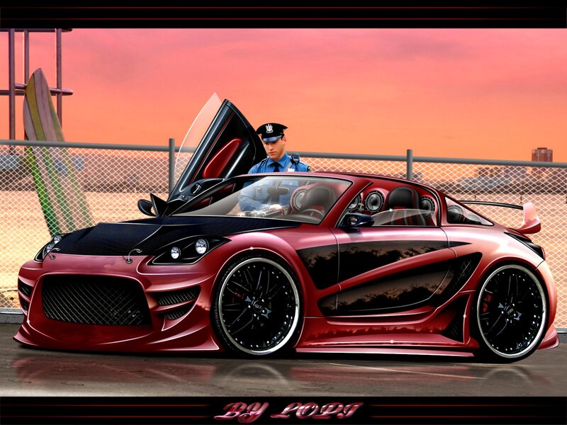 Police officer with red sports car