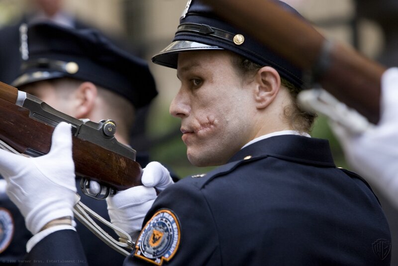 police officer with scar