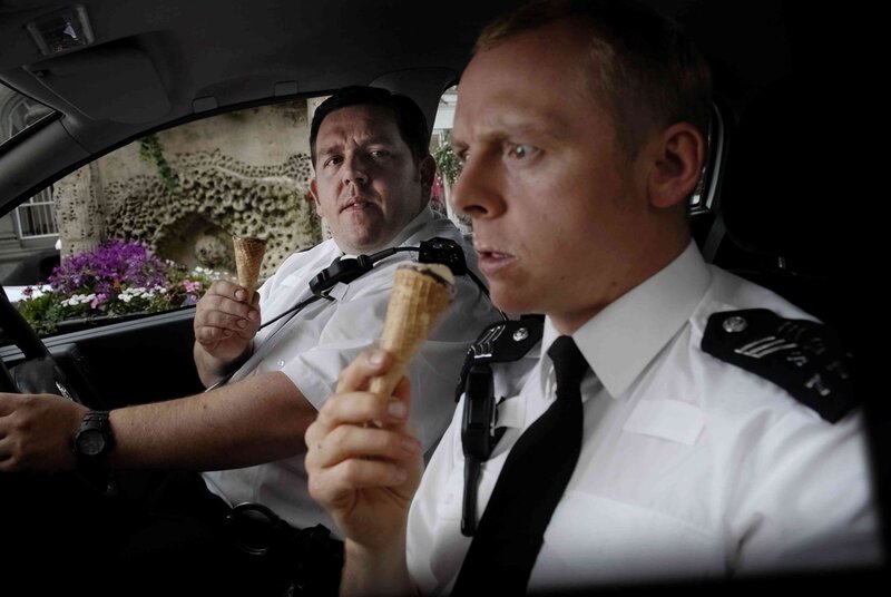 Police officers eating ice cream
