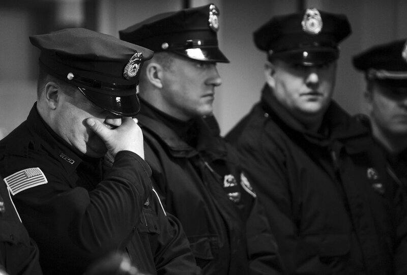 Police Officers in Uniform — Black