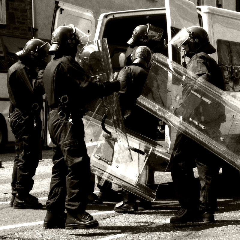 Police officers with riot shields