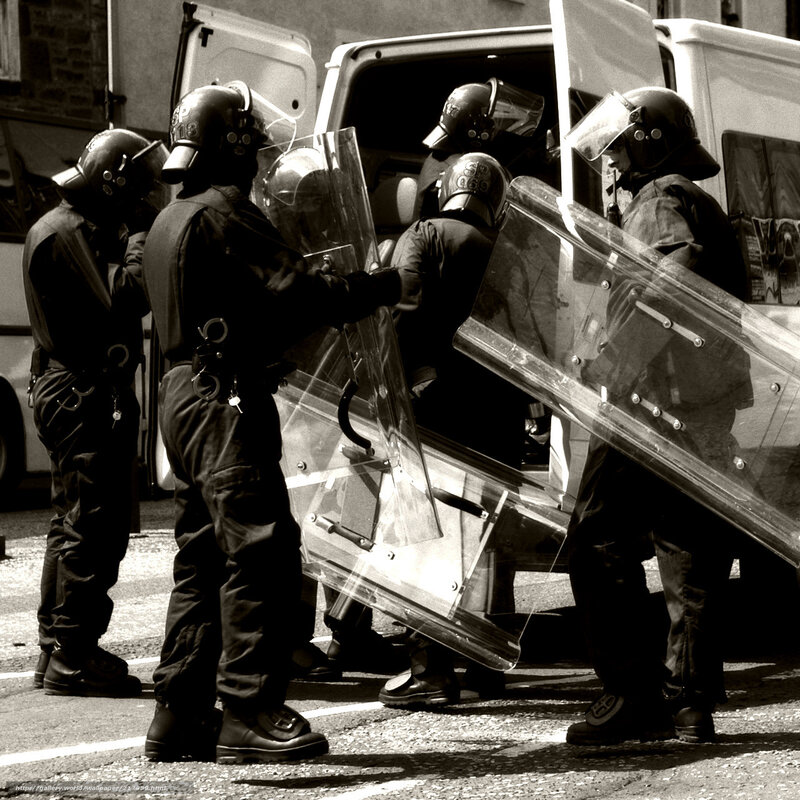 Police officers with riot shields