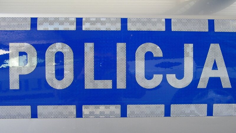 Police sign in blue and white