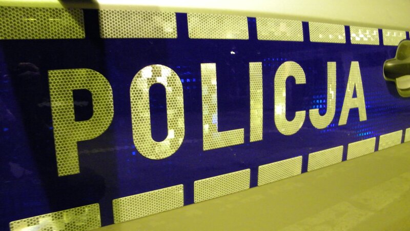 Police sign in blue and yellow