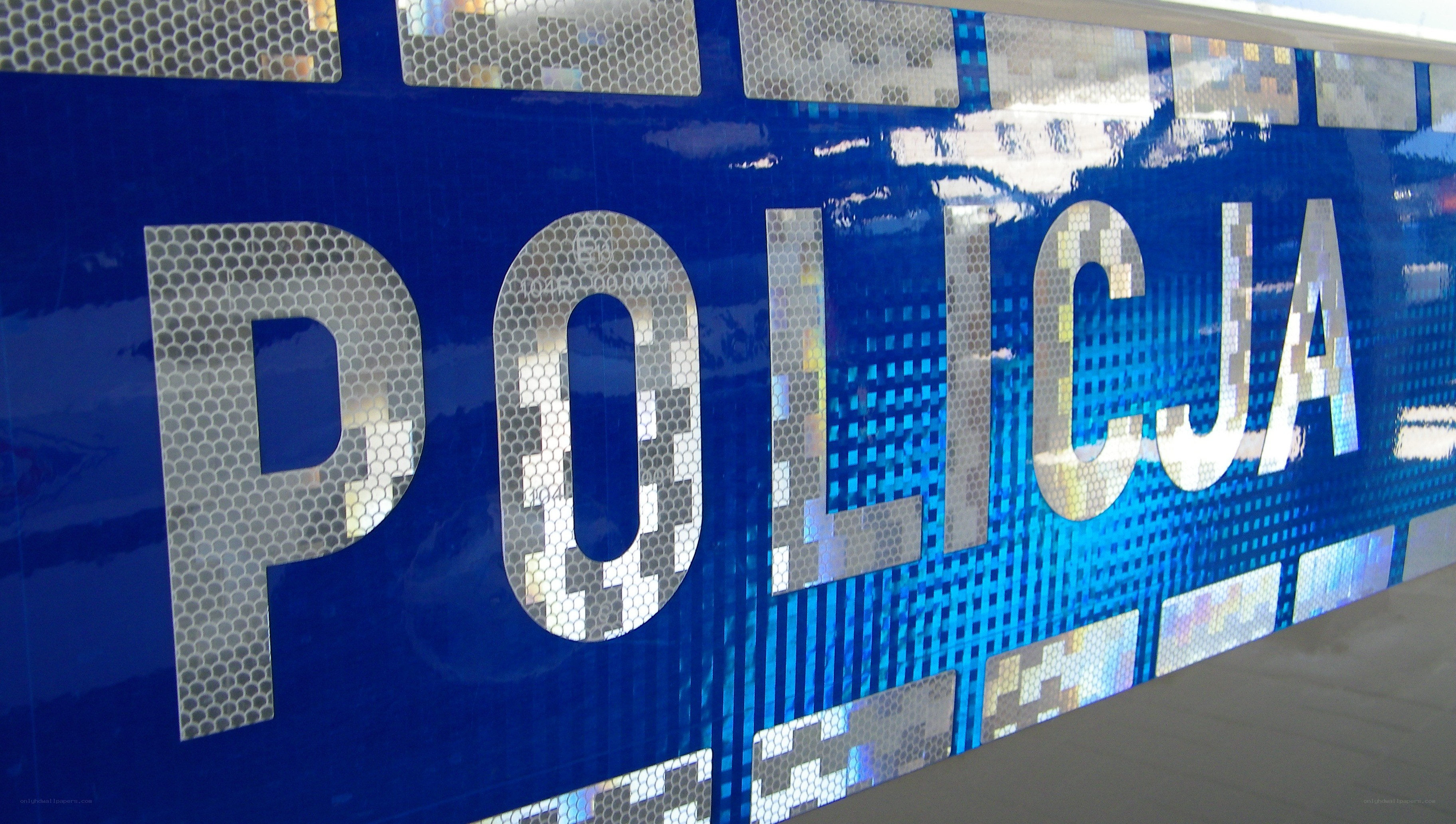 Police sign in blue