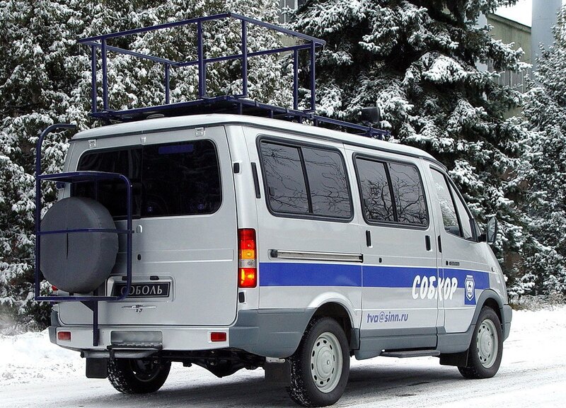 Police van in snowy forest