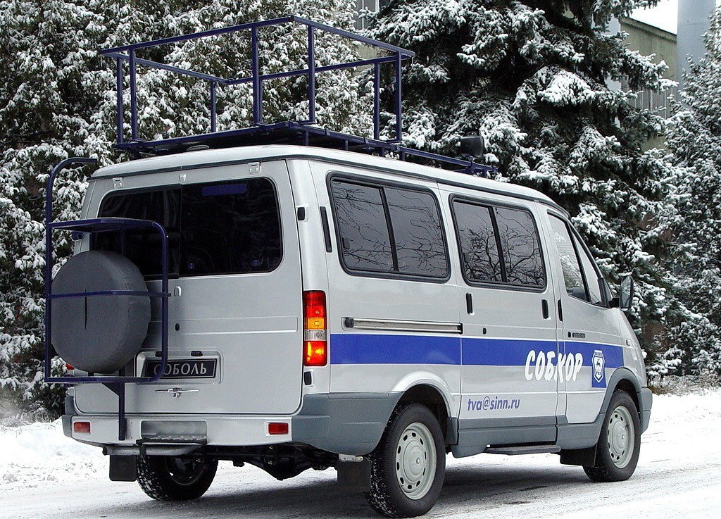 Police van in snowy forest