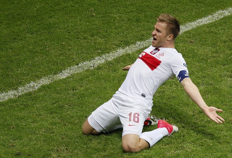Polish footballer celebrating goal