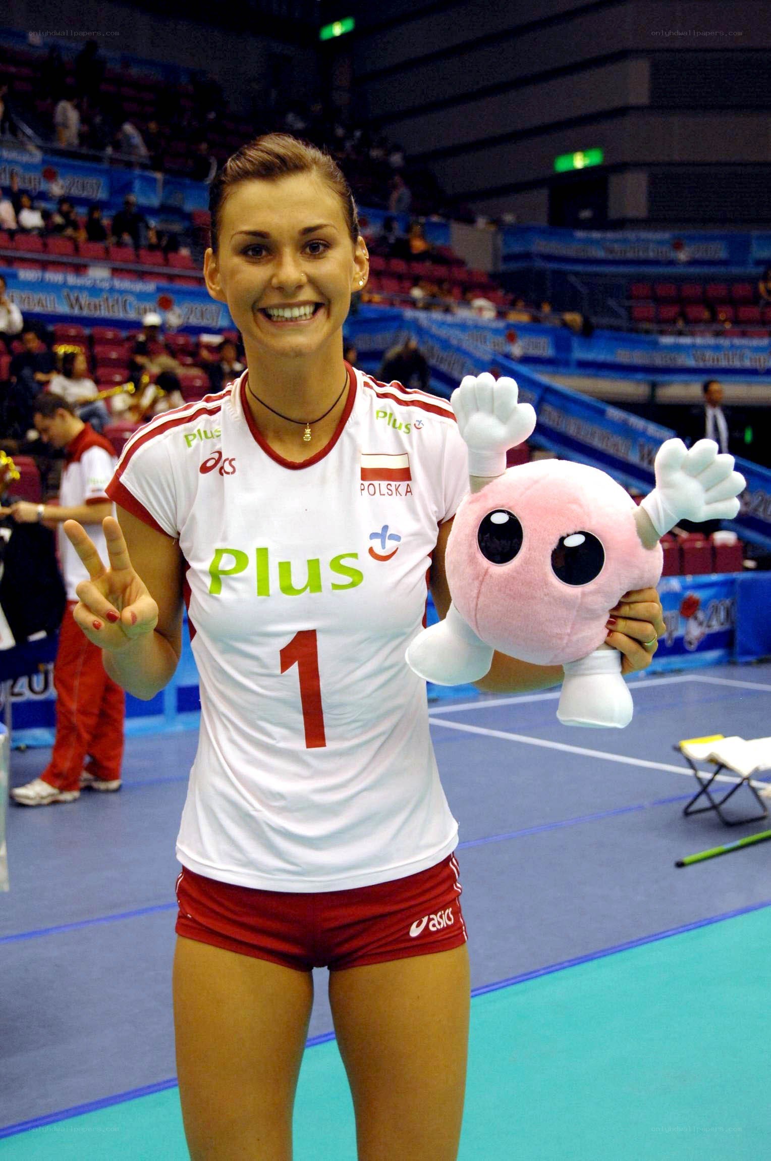 Polish volleyball player with mascot