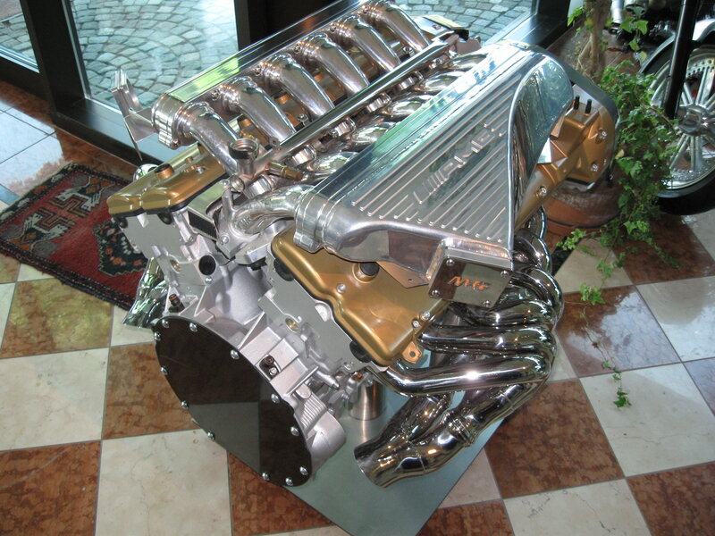 polished V12 engine display