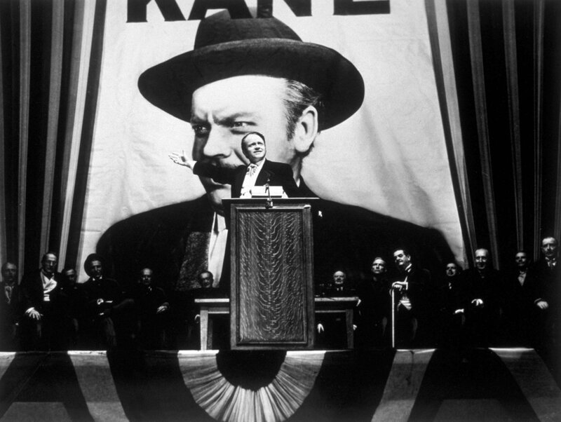 Political rally with large portrait