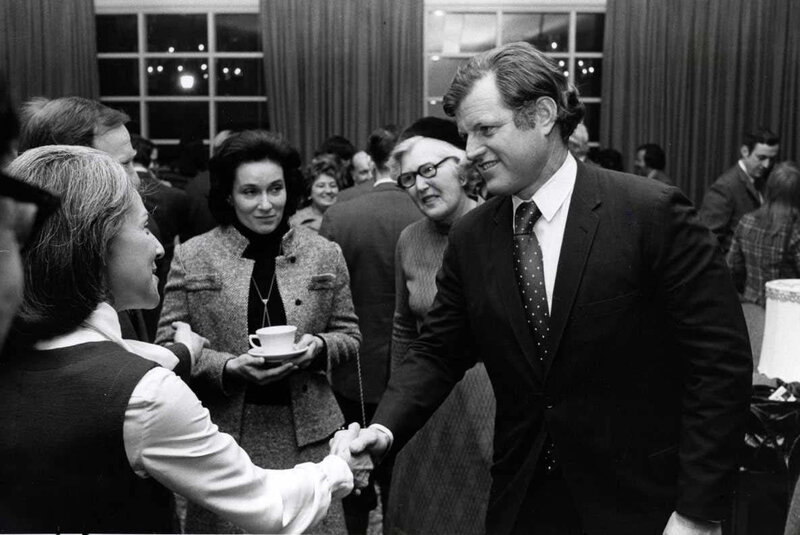 Politician shaking hands at event