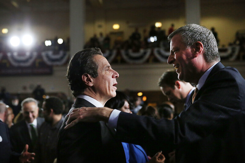 Politicians shaking hands at event