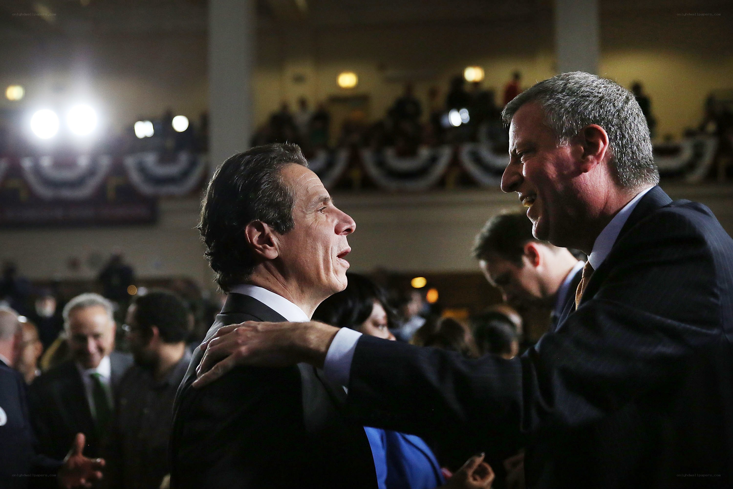 Politicians shaking hands at event