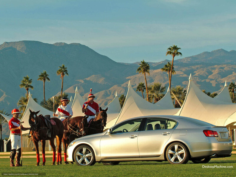 Polo players with car at resort
