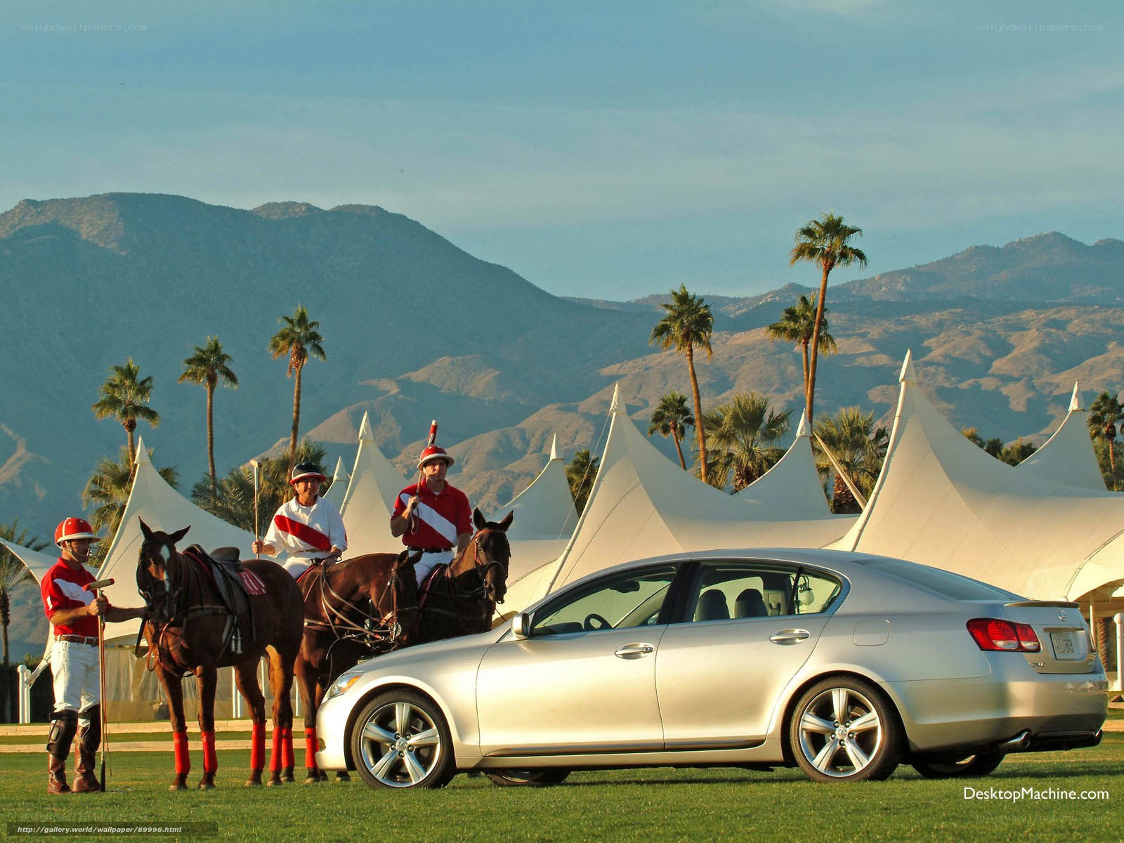 Polo players with car at resort