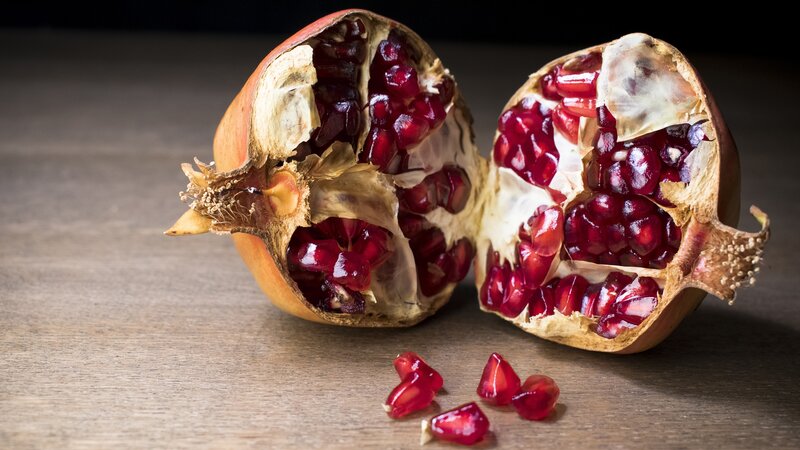 Pomegranate Cut in Half — Red, Dramatic