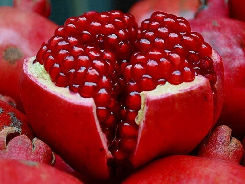 Pomegranate Fruit — Red, Vibrant, Photograph, Seeds