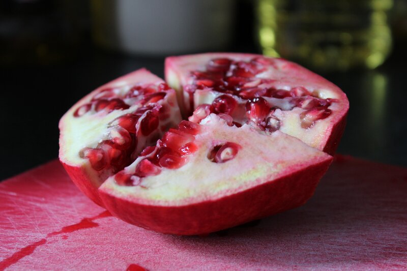 Pomegranate on Cutting Board