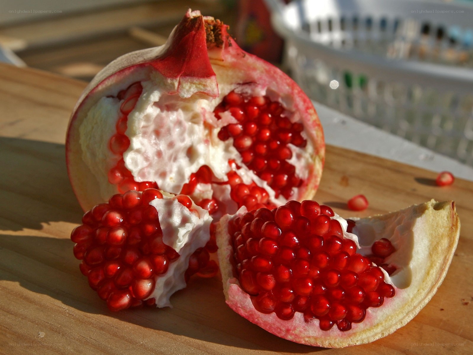 Pomegranate on wooden surface