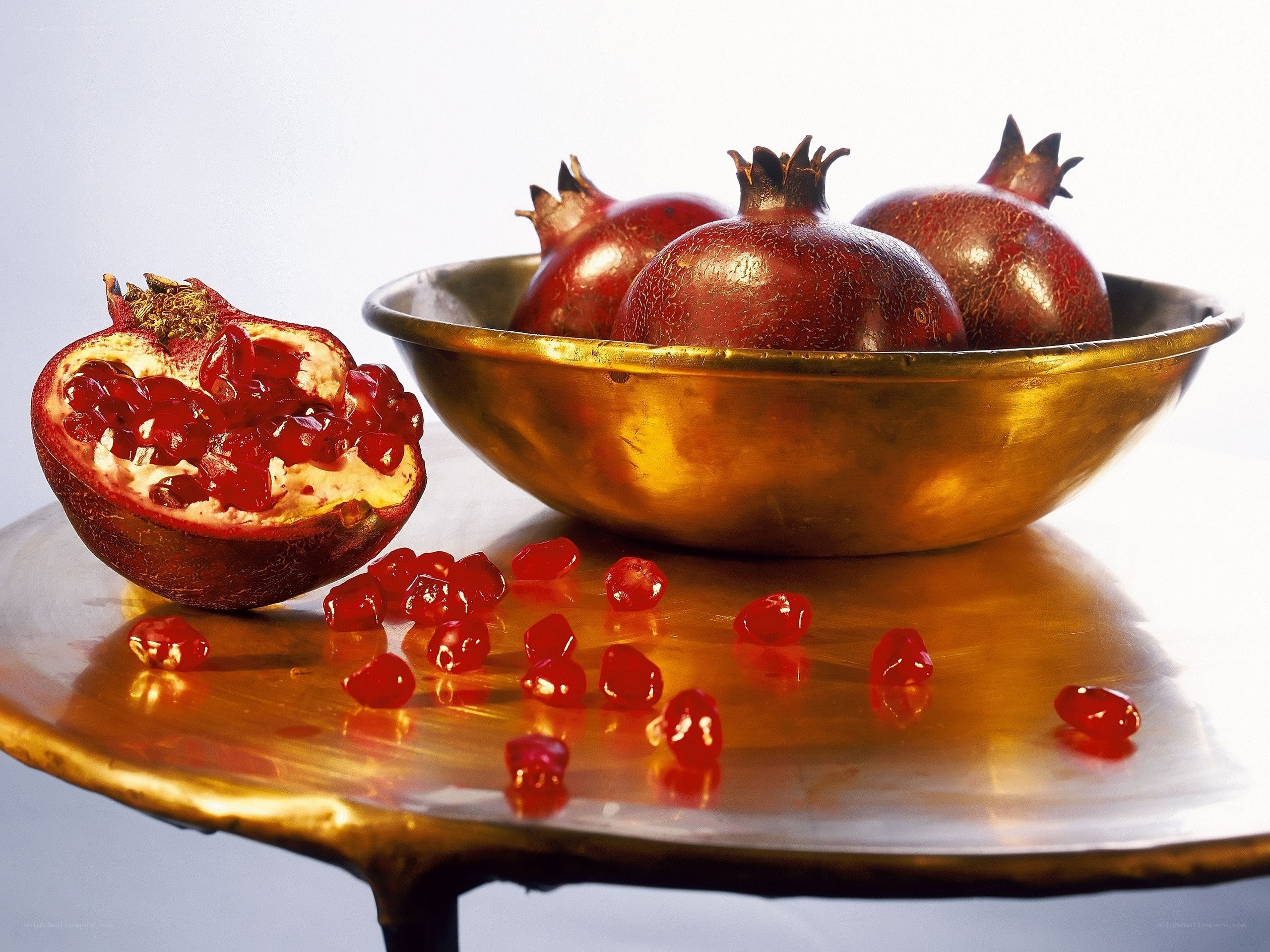 Pomegranates in a brass bowl