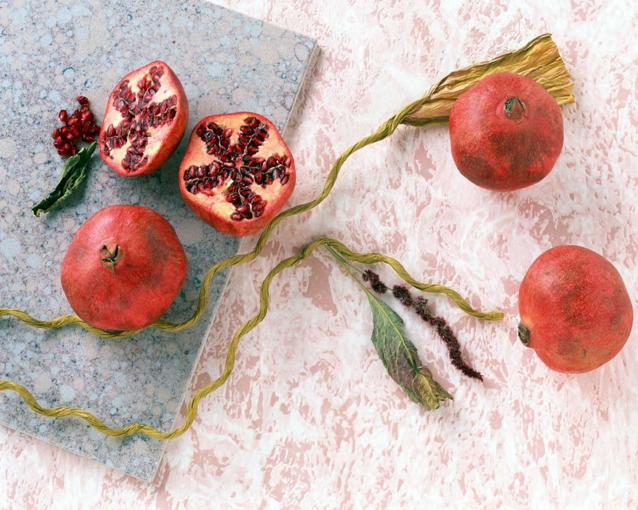 Pomegranates on a marble surface
