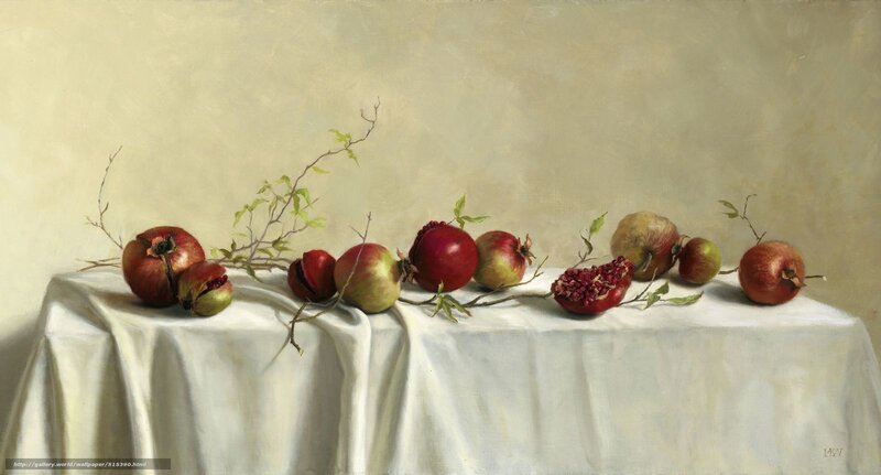 Pomegranates on a white cloth
