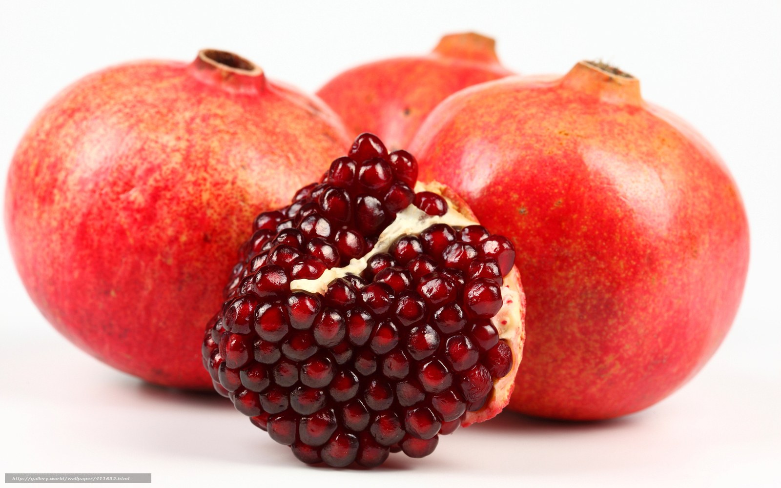 Pomegranates on white background