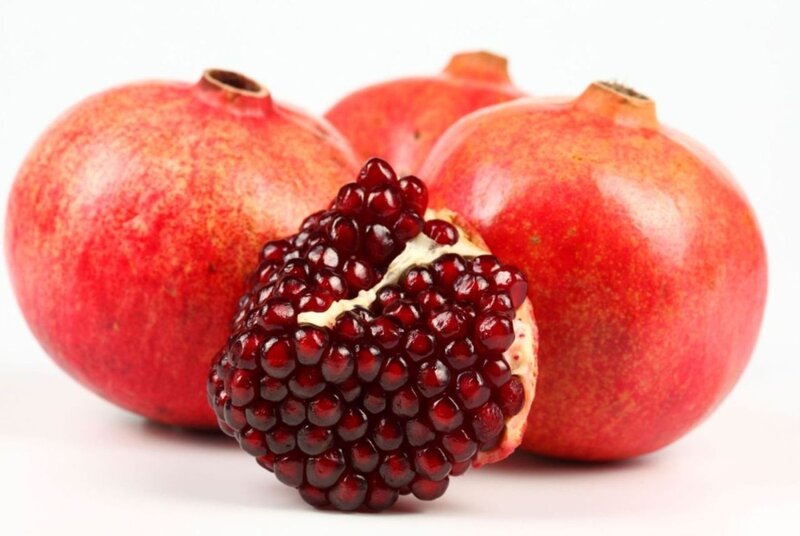 Pomegranates on white background