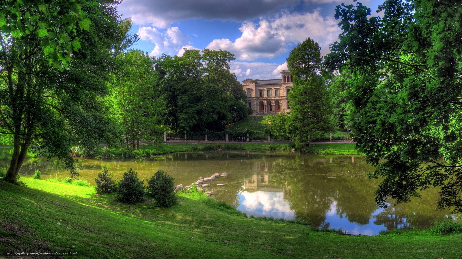 Pond and mansion in a park