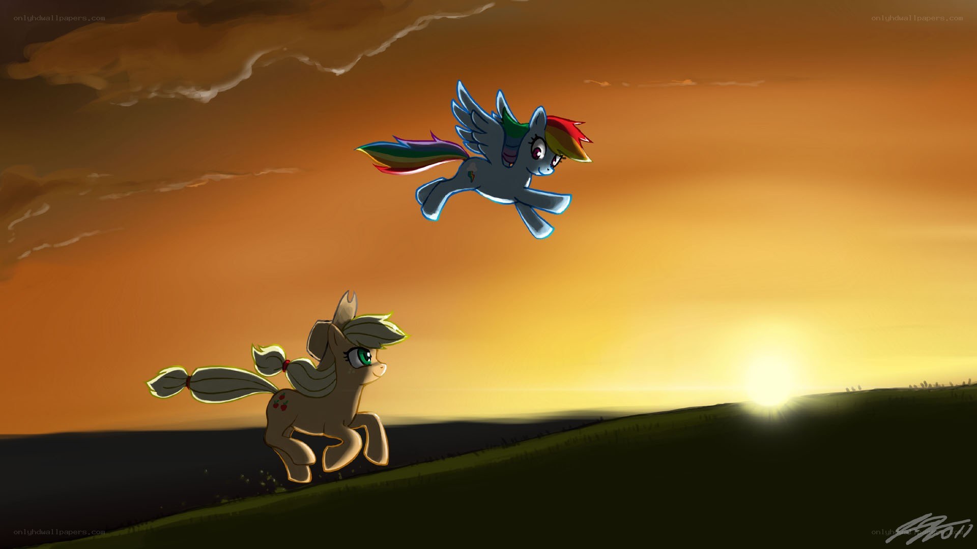ponies at sunset