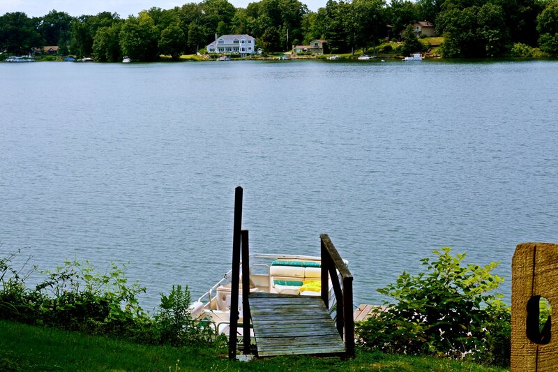 Pontoon Boat at Dock — Green