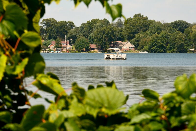 Pontoon Boat on Lake — Green, Serene, Afternoon, Photograph