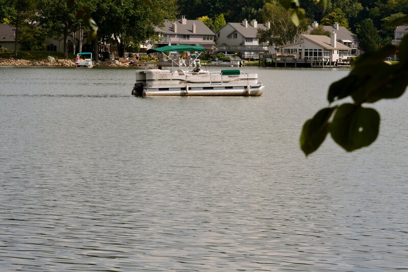 Pontoon Boat on Lake — Green, Serene
