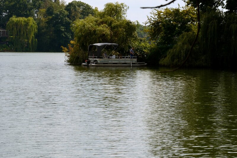 Pontoon Boat on Lake — Green
