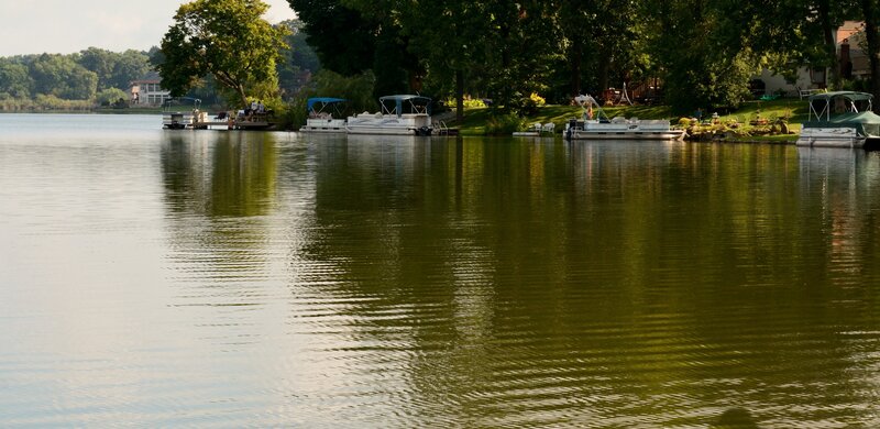 Pontoon Boats on Lake — Green, Serene