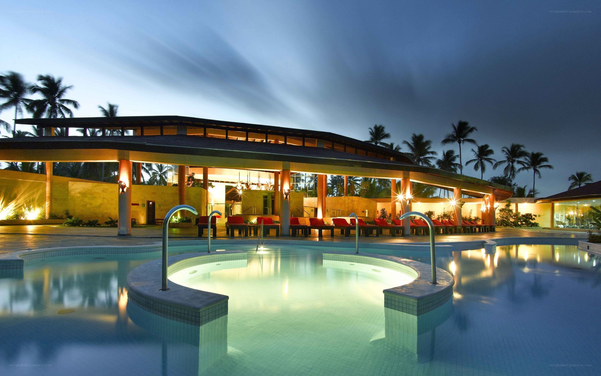pool area at resort at dusk