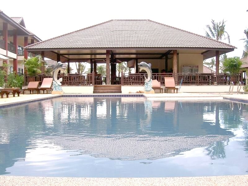 Pool area with dolphin statues