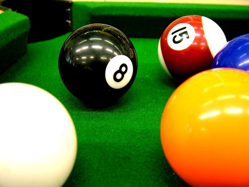 Pool balls on a green table