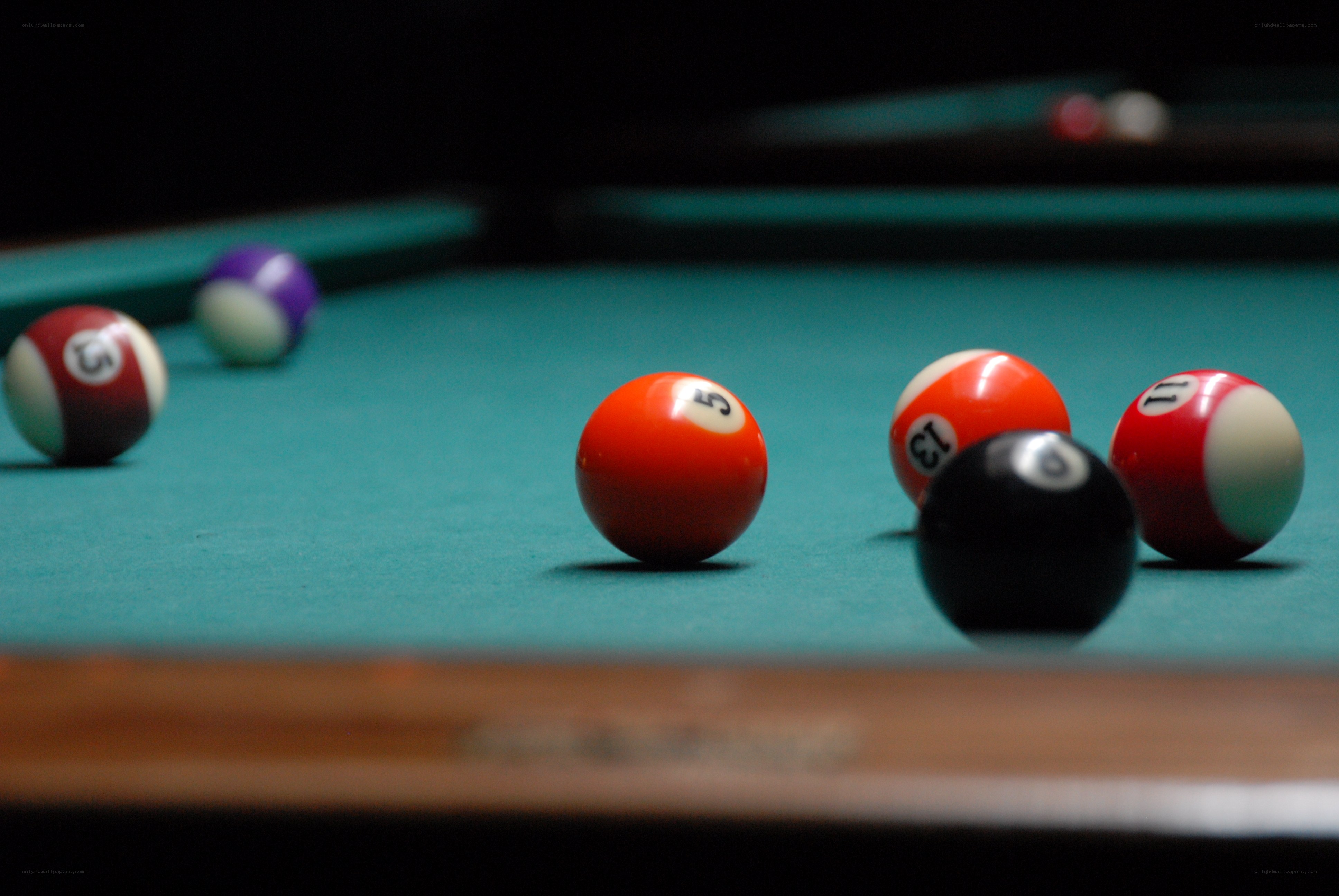 pool balls on a green table